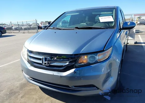 2014 Honda Odyssey Ex-L from USA, damaged, VIN 5FNRL5H6XEB021015